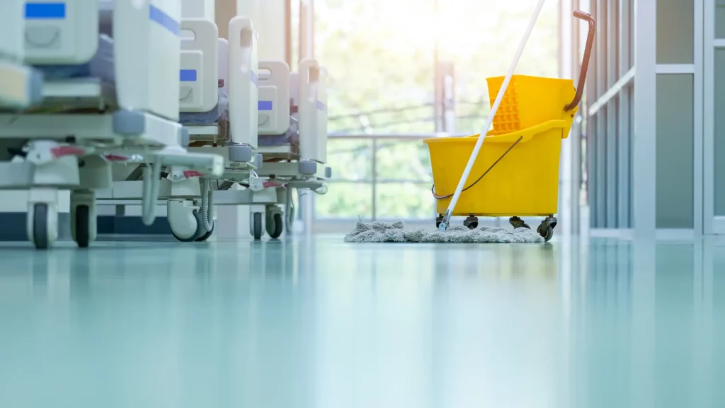 Cleaning a seamless resin floor in a hospital ward